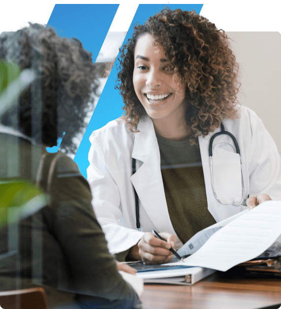 Doctor explaining patient medical data and treatment options during a consultation